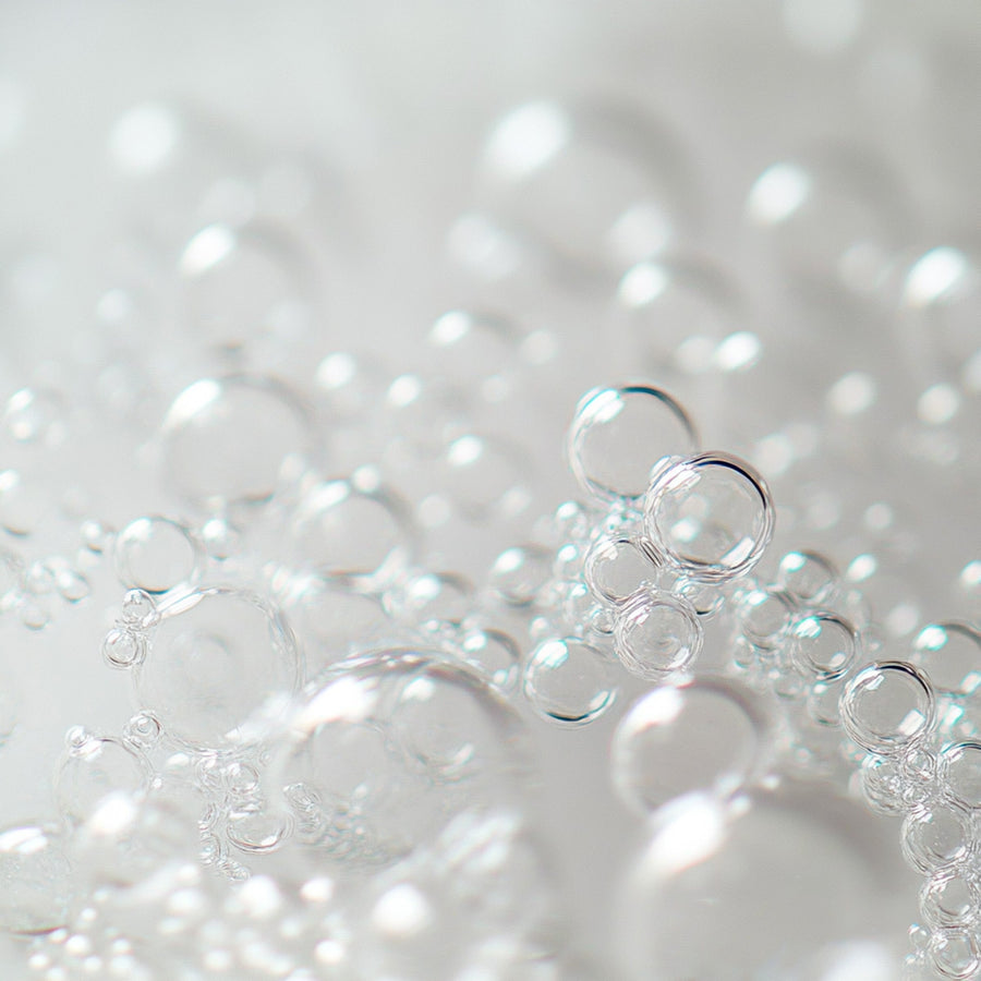 Detail view of Simplehuman Multi-Surface Cleaning Tablets foam, showing dense cleaning lather and bubbles.