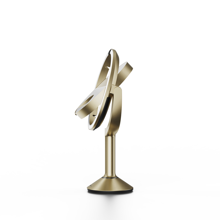 Simplehuman's Sensor Mirror Trio in Matte Gold, flipping angle. 
