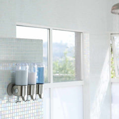 triple wall mount pump - lifestyle in shower