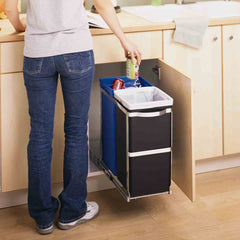 35L dual compartment under counter pull-out bin - lifestyle man throwing bin away