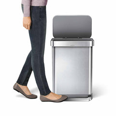 55L rectangular pedal bin with liner pocket - brushed finish with plastic lid - foot stepping on pedal image