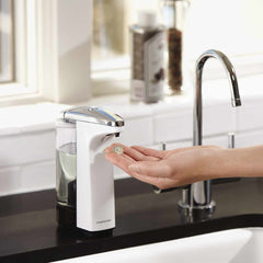 237ml sensor pump - white finish - lifestyle hand using pump on kitchen countertop